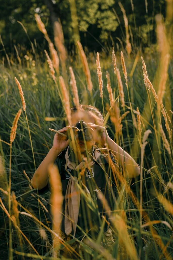 A Girl Using Binoculars